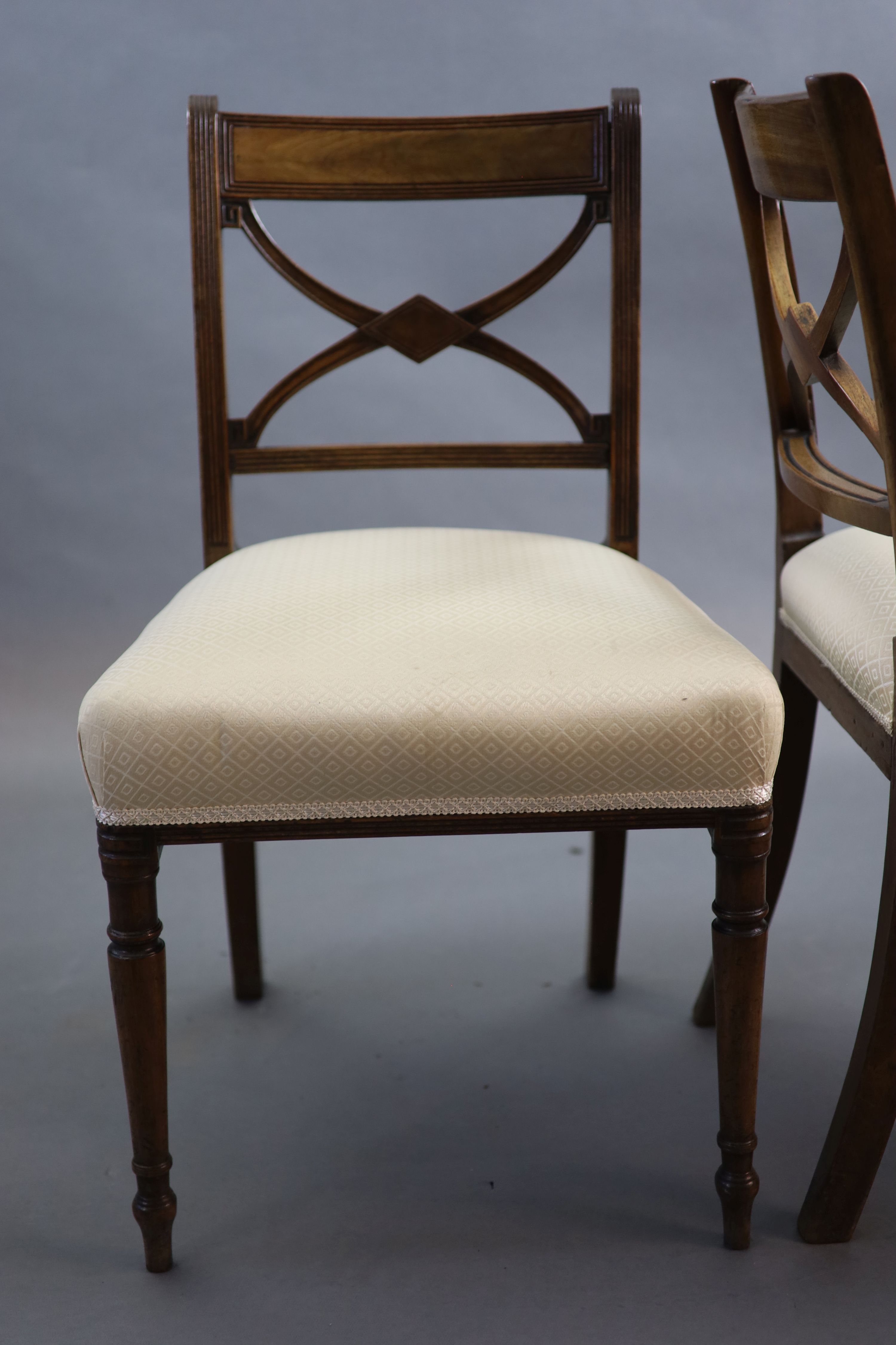 A set of six Regency mahogany dining chairs